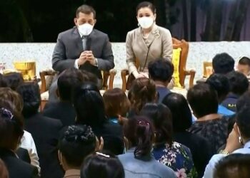 Thai king tells massacre victims’ families ‘I share your grief’