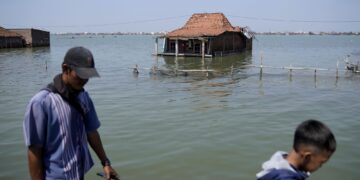 Climate Migration: Floods displace villagers in Indonesia