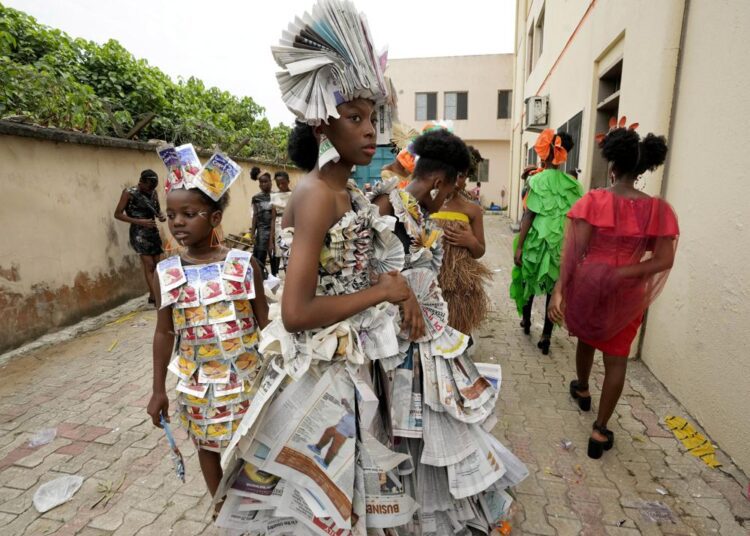 Nigerian teens create fashion from trash to fight pollution 1 - Egyptian Gazette