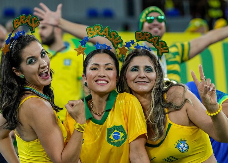 Brazil supporters cheer prior to the World Cup Group G match against Switzerland.
