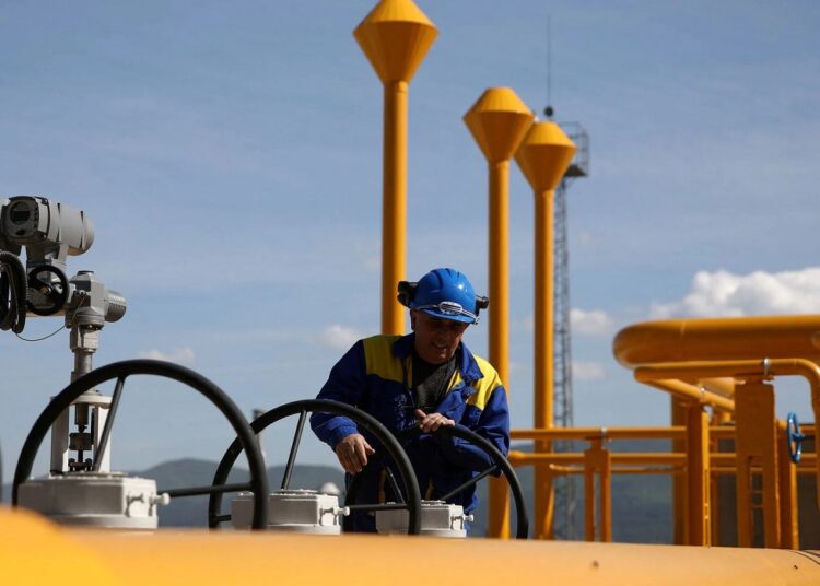 An employee works at Bulgartransgaz gas compressor station near Ihtiman, Bulgaria, May 12, 2022.