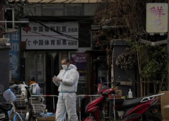 China eases Covid rules after protests, keeps wider strategy