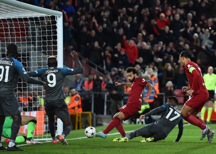 Liverpool's Mohamed Salah scores against Napoli in the UEFA Champions League last Tuesday.