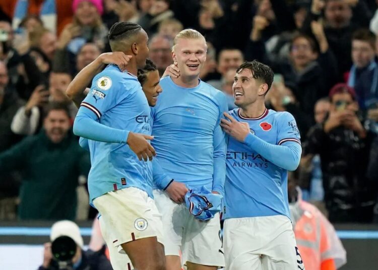 EPL: Haaland late show sends City top, Leeds win thriller 1 - Egyptian Gazette Manchester City's Erling Braut Haaland celebrates scoring their second goal with teammates.