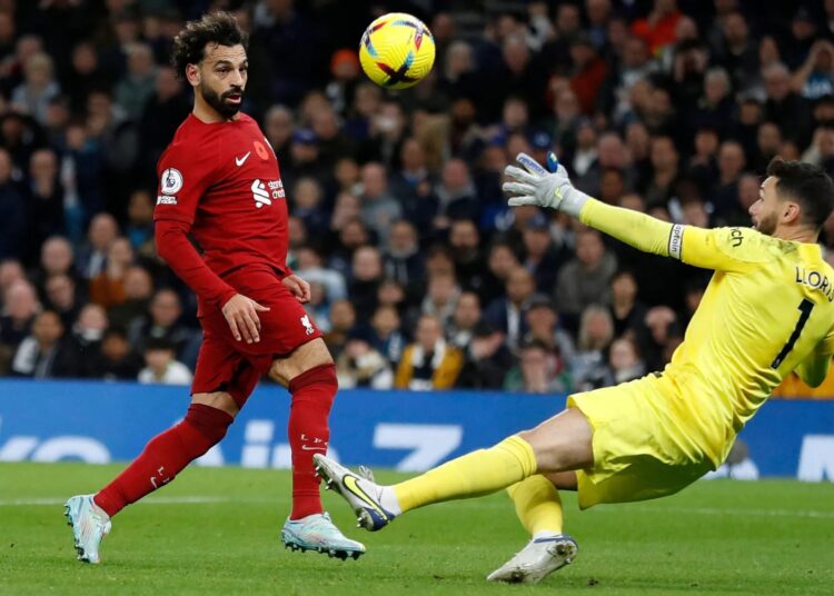 Liverpool's Mohamed Salah scores their second goal against Tottenham Hotspur. The Egyptian scored twice in the first-half in north London as he lifts a deft a finish over Spurs goalkeeper Hugo Lloris