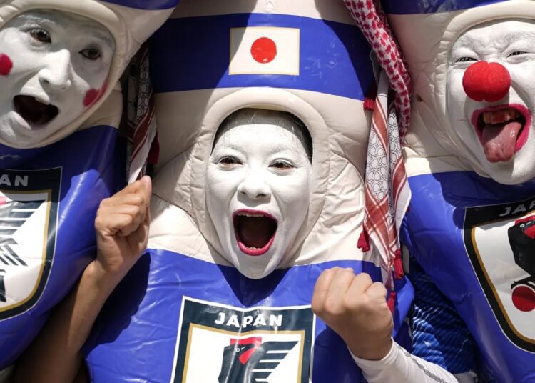 Japanese supporters during the World Cup match between Costa Rica and Japan at the Ahmad Bin Ali Stadium.