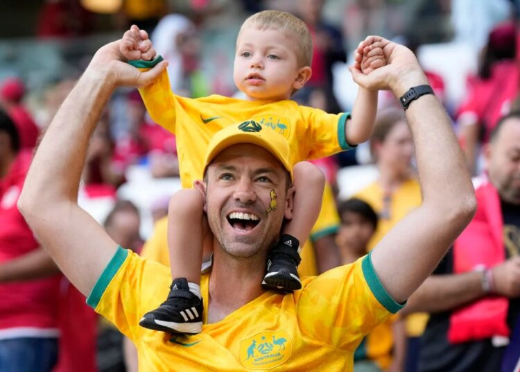 Australia supporter cheer before the start of the World Cup group D match between Tunisia and Australia Saturday, Nov. 26, 2022.