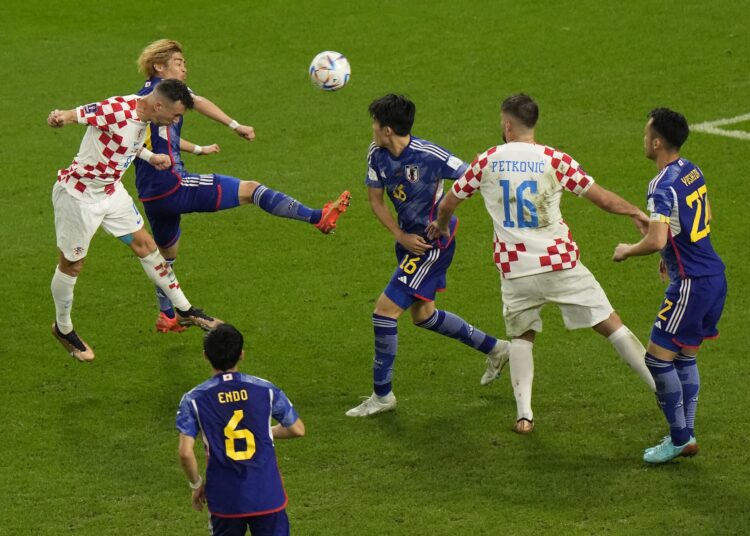 Croatia can't win 'without drama' 1 - Egyptian Gazette Croatia's Ivan Perisic (L) scores his side's opening goal during the World Cup round of 16 match against Japan.