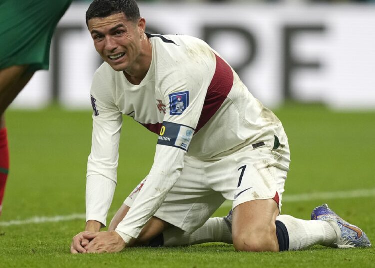 Portugal’s Cristiano Ronaldo reacts after his team lost the quarter-final match against Morocco on December 10, 2022.