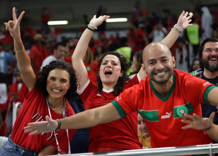 Morocco’s fans cheer during the match against Portugal as Morocco progressed to the semi finals.