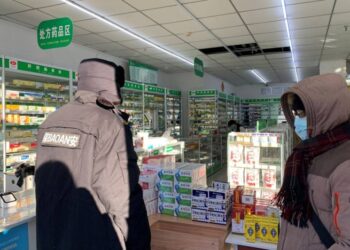 China’s cities battle first wave of Covid surge as wider spread looms