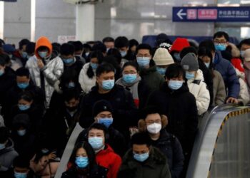 Beijing, Shanghai residents back to work as China eases into living with Covid