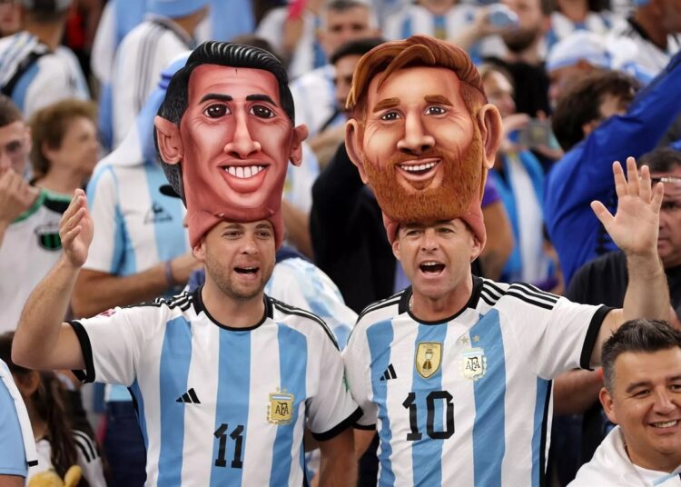 Argentina supporters cheer before the World Cup quarter-final match against the Netherlands.