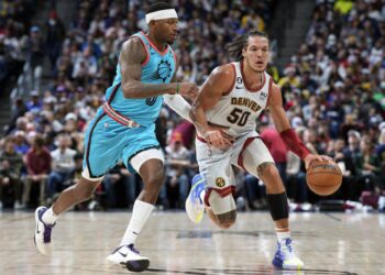 Irving, Durant lead Nets past Cavs 125-117