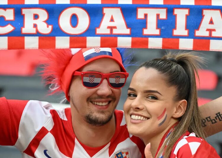 Japan, Spain, Croatia advance as Germany out of World Cup 1 - Egyptian Gazette Supporters of Croatia before the start of Group F match against Belgium on Dec. 1, 2022.