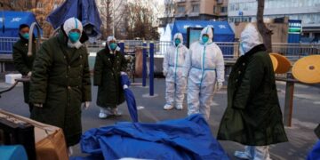 China’s capital swings from anger over zero-Covid to coping with infections