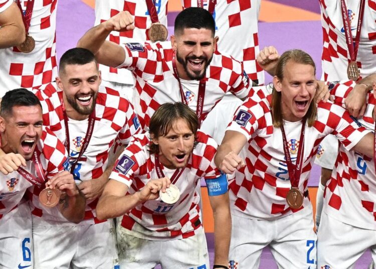 Morocco's miraculous run at World Cup ends 1 - Egyptian Gazette Croatia's players pose with the third place medals with a 2-1 victory over Morocco.