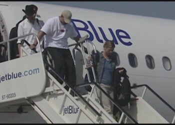 Passenger laptop fire forces plane evacuation at JFK Airport