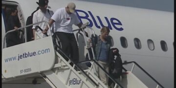 Passenger laptop fire forces plane evacuation at JFK Airport