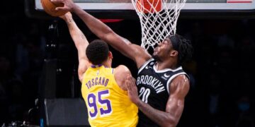 Irving leads Nets past Lakers 121-104