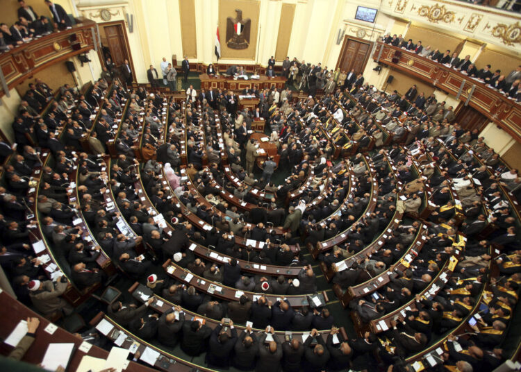 A general view of  the first Egyptian parliament session after the revolution that ousted former President Hosni Mubarak, in Cairo January 23, 2012. Egypt's parliament began its first session on Monday since an election put Islamists in charge of the assembly following the overthrow of Mubarak in February.  REUTERS/Khaled Elfiqi/Pool (EGYPT - Tags: POLITICS) - RTR2WPY5