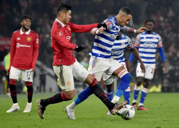 FA Cup: Tottenham, Leicester, Man Utd reach 5th round 1 - Egyptian Gazette Manchester United's Casemiro (L) tackles Reading's Lucas Joao during the English FA Cup 4th round match in Manchester.