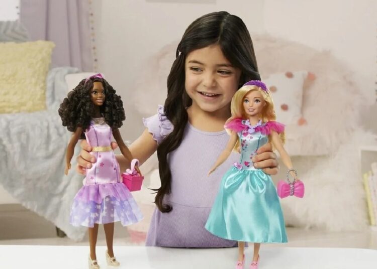 New, taller Barbie doll is aimed at kids as young as 3 1 - Egyptian Gazette This image released by Mattel shows a child playing with Teresa, a My First Barbie deluxe set, new dolls made specifically for children as young as 3. They are 13.5 inches tall, with a broader waste that de-emphasizes the bust line, with flesh-tone modesty undergarments permanently attached.
