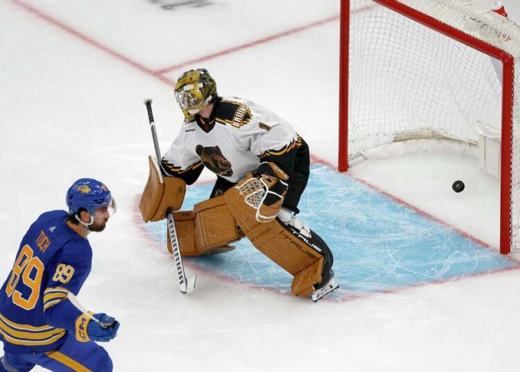 Buffalo Sabres right wing Alex Tuch (89) scores a goal past Boston Bruins goaltender Jeremy Swayman (1) during an NHL game in Boston.