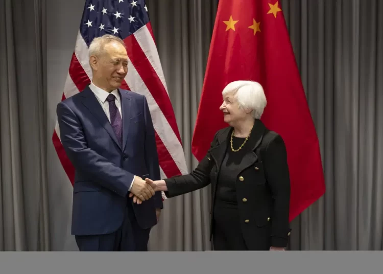Treasury Secretary Janet Yellen, (R), shaking hands with China's Vice-Premier Liu He during a bilateral meeting in Zurich, Switzerland on Wednesday, January 18, 2023.