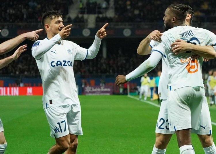 Third-placed Marseille won at Montpellier 2-1 for its third straight win in the French league.