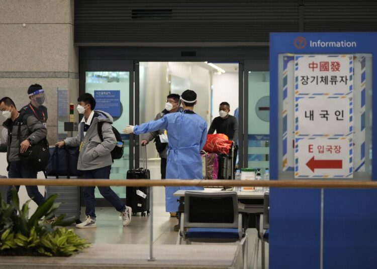 South Korea extends restrictions on travelers from China 1 - Egyptian Gazette Passengers coming from China arrive at the Incheon International Airport in Incheon, South Korea, on Jan. 14, 2023.
