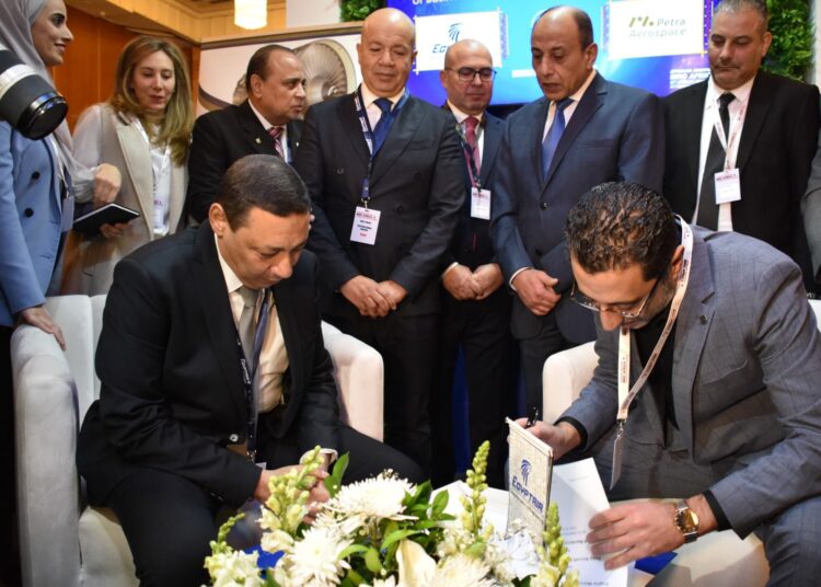 EgyptAir Maintenance & Engineering signs partnership contract with Jordan’s Petra Aerospace 1 - Egyptian Gazette Waleed el-Khafif signing the partnership contract with the Jordanian company.