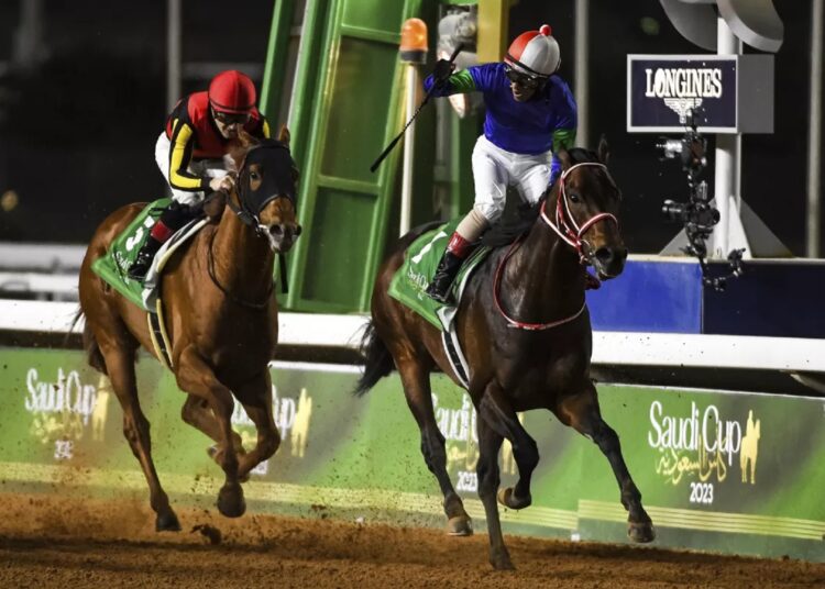 Jockey Yutaka Yoshida celebrates after riding Panthalassa to victory in the $20-million Saudi Cup.