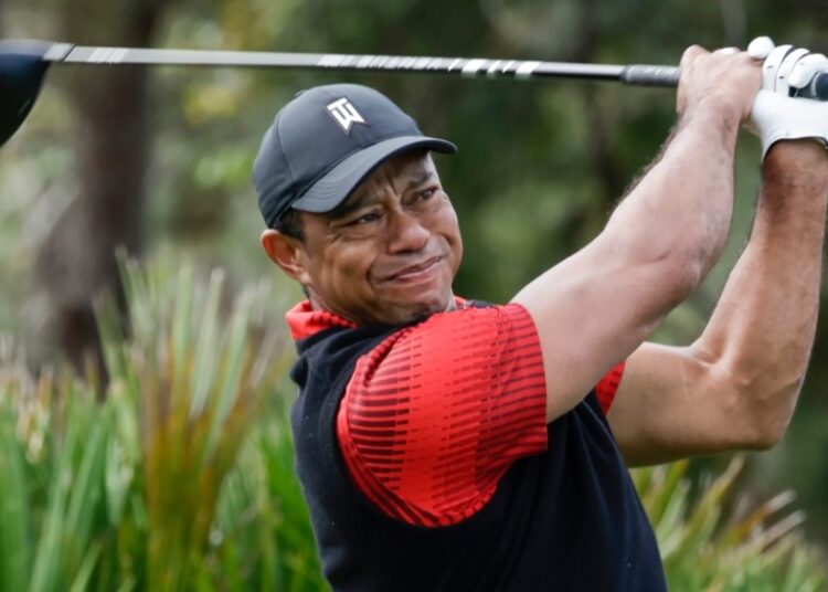 Tiger Woods tees off of the 3rd hole during the final round of the PNC Championship golf tournament on Dec. 18, 2022, in Orlando, Fla.