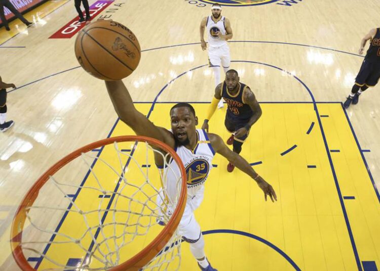 Kevin Durant backs Suns for NBA title 1 - Egyptian Gazette A file photo shows Kevin Durant of Golden State Warriors dunks against Utah Jazz on May 2, 2017 in Oakland.
