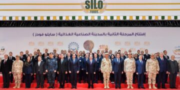 Sisi poses for photo op with Silo Foods staffers