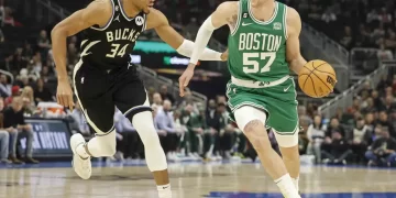 Bucks edge Celtics 131-125 in OT for 11th straight win