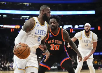 James has triple-double, leads Lakers past Knicks in OT