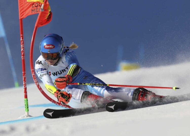 Mikaela Shiffrin speeds down the course during an alpine ski World Championships giant slalom, in Meribel.