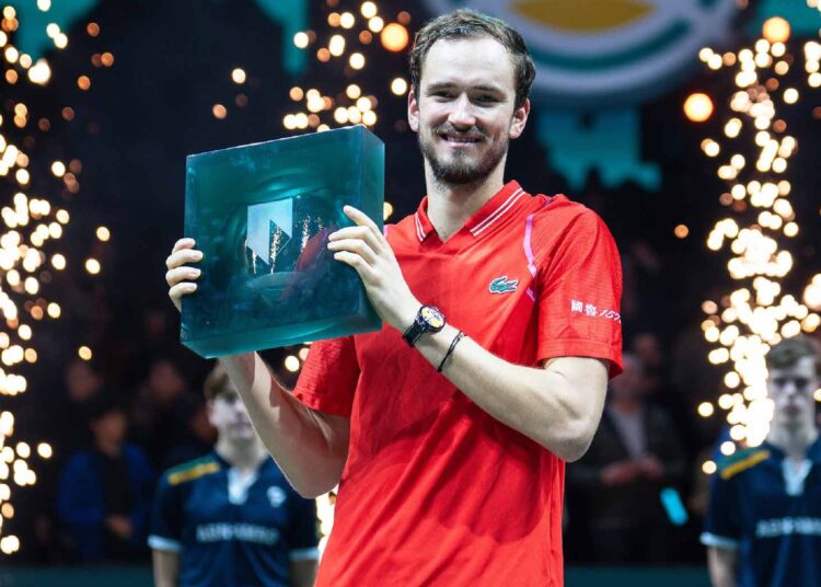 Daniil Medvedev poses with the Rotterdam Open trophy.