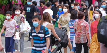 Singapore relaxes COVID travel curbs