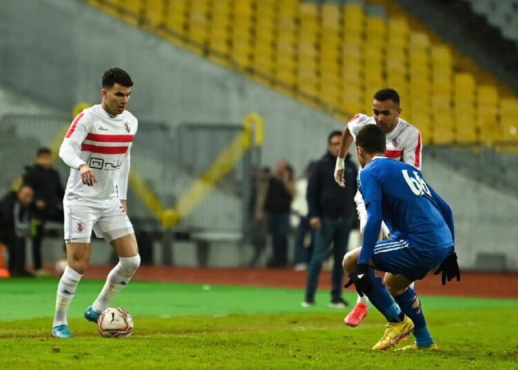 Zamalek’s winger Ahmed Sayed ‘Zizo’ (L) vies for the ball against Smouha’s defender Mohamed Maghraby during their match at the Egyptian Premier League.