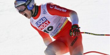 Odermatt draws Federer comparison after downhill gold