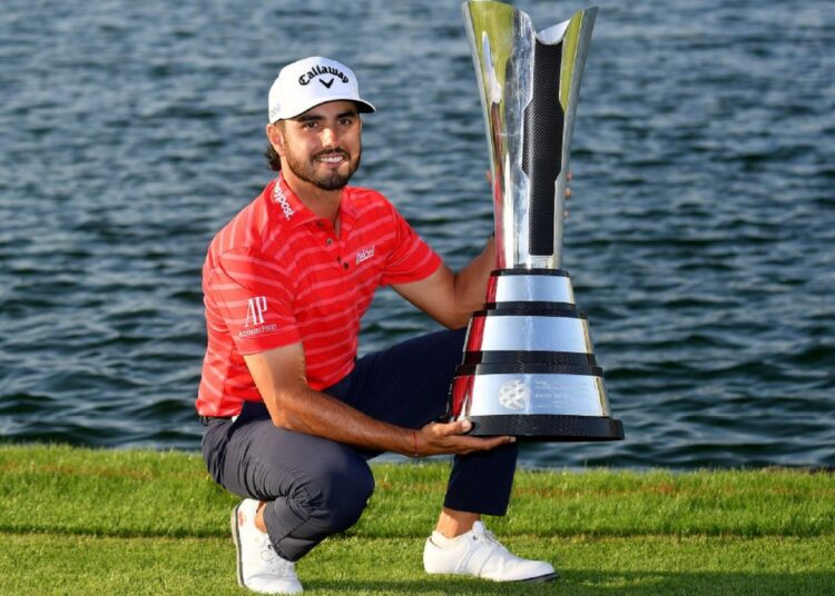 Abraham Ancer claims Saudi golf International 1 - Egyptian Gazette Abraham Ancer poses with the trophy after winning the Saudi Golf International.