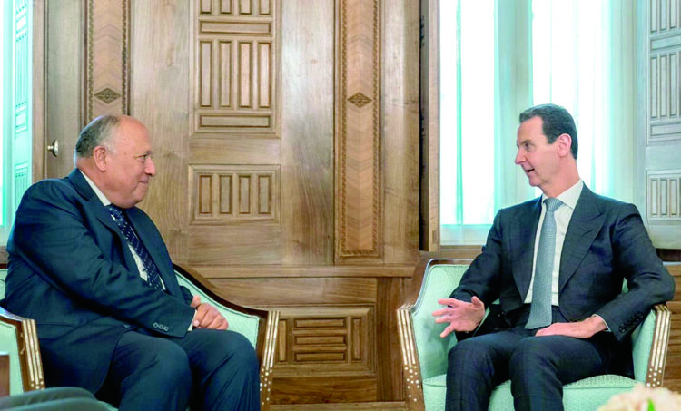 FM in Syria, Türkiye to express Cairo’s solidarity after devastating quake 1 - Egyptian Gazette Foreign Minister Sameh Shoukri during his meeting with Syrian President Bashar al-Assad in Syria on Monday.