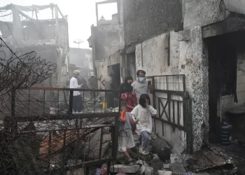 Indonesia fuel depot fire kills 18, over dozen missing