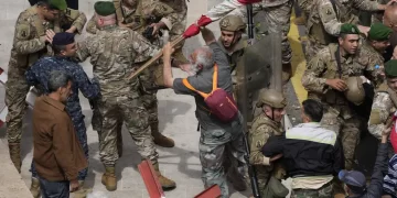 Retired soldiers, policemen try to storm government headquarters in Lebanon