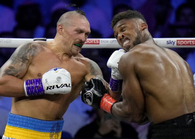 Ukraine's Oleksandr Usyk (L) defeated Britain's Anthony Joshua via unanimous point decision in Jeddah, Saudi Arabia on August 21, 2022.