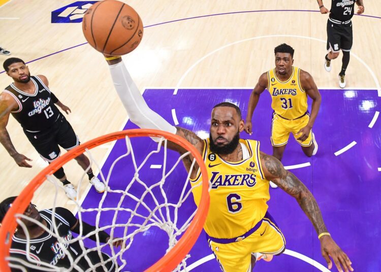 A file photo shows LeBron James goes up for a dunk during Los Angeles Lakers’ match against the Los Angeles Clippers.