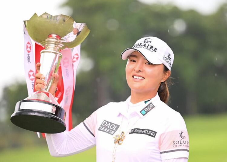 South Korea's Ko Jin-young poses with the trophy after winning the Women’s World Championship in Singapore, on March 5, 2023.